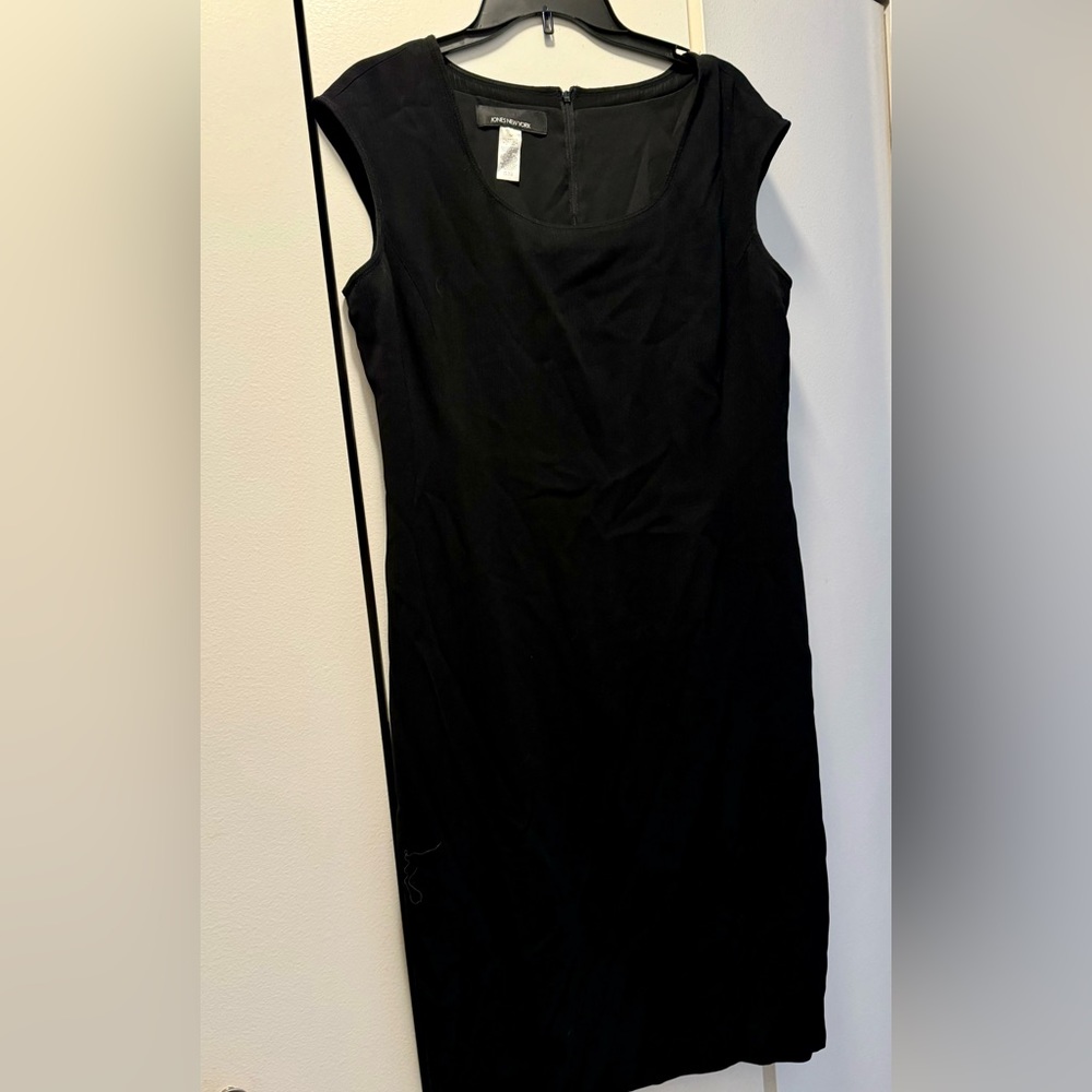 Beautiful fully lined black dress.